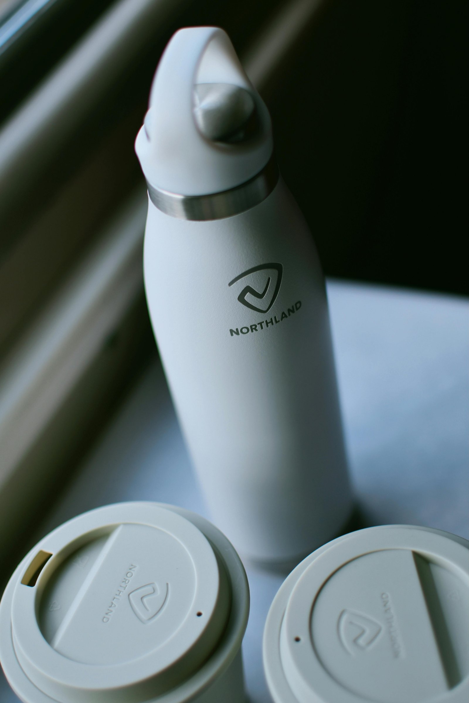 A stylish, reusable water bottle with a custom logo